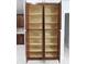Pantry featuring open wood shelving providing ample storage space at 19109 Beckett Dr, Odessa, FL 33556