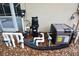 Pool equipment located outside with a pool and screened-in porch in the background at 19109 Beckett Dr, Odessa, FL 33556