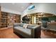 Inviting living room with built-in bookshelves and an arched study nook creates a cozy and functional space at 200 Grand Blvd, Tarpon Springs, FL 34689