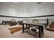 Spacious recreation room features a unique ceiling, ample seating, and a striking stained glass window at 200 Grand Blvd, Tarpon Springs, FL 34689