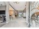 Open-concept living area with tiled floors, offering seamless access to the dining and outdoor spaces with sliding glass doors at 22129 Yachtclub Ter, Land O Lakes, FL 34639