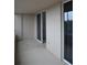 Balcony with sliding glass doors provides access to the living space at 2333 Feather Sound Dr # A208, Clearwater, FL 33762