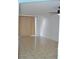 Bright living room with tile floors, ceiling fan, and neutral paint at 2333 Feather Sound Dr # A208, Clearwater, FL 33762