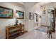 Elegant entrance hall with high ceilings, artwork, and a view of the front door at 2375 Fairskies Dr, Spring Hill, FL 34606