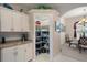 Walk-in pantry with built-in shelving and ample storage space located near a dining area at 2375 Fairskies Dr, Spring Hill, FL 34606