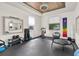 Bright home gym with ample space for equipment, mirrors, and natural light at 2596 Whittler Br, Odessa, FL 33556