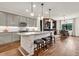 Modern kitchen with center island, bar stool seating, and stainless steel appliances at 2596 Whittler Br, Odessa, FL 33556