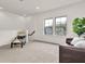 Cozy loft area with natural light and comfortable seating at 2596 Whittler Br, Odessa, FL 33556