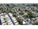 An aerial shot shows a waterfront property with easy water access nestled in a neighborhood near canals and waterways at 2620 Baltic Pl, Holiday, FL 34691