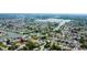 Aerial view showcasing a waterfront property near a marina, providing convenient boating opportunities and scenic views at 2620 Baltic Pl, Holiday, FL 34691