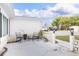 Outdoor patio featuring comfortable seating and decorative accents; perfect for relaxing and enjoying the outdoors at 2620 Baltic Pl, Holiday, FL 34691