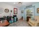 Inviting bedroom with cool colors and a desk perfect for a home office at 2628 Shipston Ave, New Port Richey, FL 34655