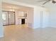View of the dining area and kitchen with modern appliances from living room at 3622 Cheswick Dr, Holiday, FL 34691