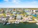Waterfront homes boast private docks and boatlifts along the canal, with scenic views of the harbor and neighborhood at 4058 Centavo Ct, Hernando Beach, FL 34607