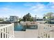 Picturesque waterfront view from the dock featuring a boat lift, perfect for enjoying the boating lifestyle at 4058 Centavo Ct, Hernando Beach, FL 34607