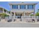 Charming coastal home with covered parking and a spacious deck, ideal for relaxing near the water at 4058 Centavo Ct, Hernando Beach, FL 34607