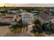 Two-story home on a well-manicured lot with a paved driveway, showcasing curb appeal and a waterfront community at 4058 Centavo Ct, Hernando Beach, FL 34607