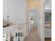 Second floor hallway leading to the rooms at 4058 Centavo Ct, Hernando Beach, FL 34607