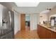 Kitchen featuring a stainless steel refrigerator and access to additional storage space at 4058 Centavo Ct, Hernando Beach, FL 34607
