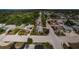 Aerial view of a residential neighborhood near a preserve, offering both community and natural beauty at 4107 Glissade Dr, New Port Richey, FL 34652