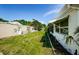 Spacious backyard featuring lush greenery and mature plantings at 4107 Glissade Dr, New Port Richey, FL 34652