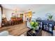Bright and inviting living room and dining area with hardwood floors at 4107 Glissade Dr, New Port Richey, FL 34652