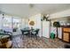 Relaxing patio boasts brick flooring, seating areas, and backyard access at 4107 Glissade Dr, New Port Richey, FL 34652