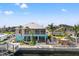 Waterfront home featuring a screened lanai, well-maintained landscaping, and a private boat dock with easy water access at 4207 Carlos Ct, Hernando Beach, FL 34607