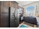 Modern kitchen featuring stainless steel appliances, granite countertops, and ample cabinet space at 4207 Carlos Ct, Hernando Beach, FL 34607