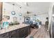 Bright and airy living room with a kitchen island and an open layout to the dining area at 4207 Carlos Ct, Hernando Beach, FL 34607