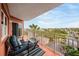 Spacious balcony with comfortable seating and panoramic views of the neighborhood at 4516 Seagull Dr # 509, New Port Richey, FL 34652