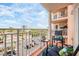 Balcony with seating offering clear views of beach, palm trees, and surrounding scenery at 4516 Seagull Dr # 509, New Port Richey, FL 34652