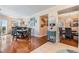 Elegant dining area with stylish furnishings, wood floors, and a view into another dining space at 4516 Seagull Dr # 509, New Port Richey, FL 34652