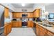 Charming kitchen featuring granite countertops and stainless steel appliances at 4516 Seagull Dr # 509, New Port Richey, FL 34652