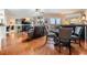 Comfortable living room with hardwood floors, ceiling fan, and ample natural light at 4516 Seagull Dr # 509, New Port Richey, FL 34652