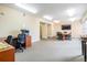 A spacious office area with a conference table, multiple chairs, and desk space at 4516 Seagull Dr # 509, New Port Richey, FL 34652