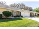 Charming home with well-manicured front lawn and beautiful landscaping at 4831 Wakefield Ct, New Port Richey, FL 34655