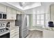 Bright kitchen with stainless steel refrigerator and new appliances and lots of light at 4831 Wakefield Ct, New Port Richey, FL 34655