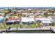 Waterfront home featuring a private dock, beautiful landscaping and close proximity to surrounding neighborhood amenities at 4936 Dory Dr, New Port Richey, FL 34652
