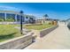 Beautiful backyard with a deck, leading to a waterfront canal and dock area at 4936 Dory Dr, New Port Richey, FL 34652