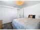 Bright bedroom featuring a neutral color scheme and stylish woven light fixture at 4936 Dory Dr, New Port Richey, FL 34652