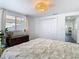 Bright bedroom with a large window, closet, and neutral colored decor at 4936 Dory Dr, New Port Richey, FL 34652