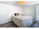 Bedroom with white walls, hardwood floors, and plenty of natural light at 4936 Dory Dr, New Port Richey, FL 34652