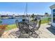 Deck offers a peaceful view of the water and canal with outdoor seating at 4936 Dory Dr, New Port Richey, FL 34652