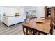 Dining room with hardwood table, visible living room at 4936 Dory Dr, New Port Richey, FL 34652