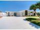 Charming, updated ranch-style home featuring a metal roof, impact windows, and a spacious driveway, close to the water at 4936 Dory Dr, New Port Richey, FL 34652