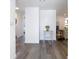 Bright foyer with hardwood floors leading to the main living area, showcasing modern finishes at 4936 Dory Dr, New Port Richey, FL 34652