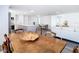 Open living spaces featuring a dining room, living room, and kitchen area at 4936 Dory Dr, New Port Richey, FL 34652