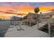Back exterior featuring private dock with boat lift providing direct access to open water at 5000 Southshore Dr, New Port Richey, FL 34652