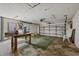 Spacious garage with work bench and automatic door at 5000 Southshore Dr, New Port Richey, FL 34652
